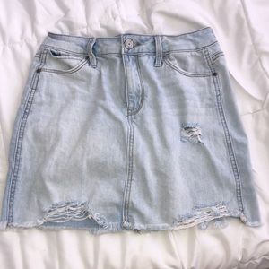 Ripped denim mini skirt